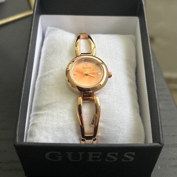 Guess Rose Gold-Tone Cutout Bracelet Analog Watch - Picture 13 of 13